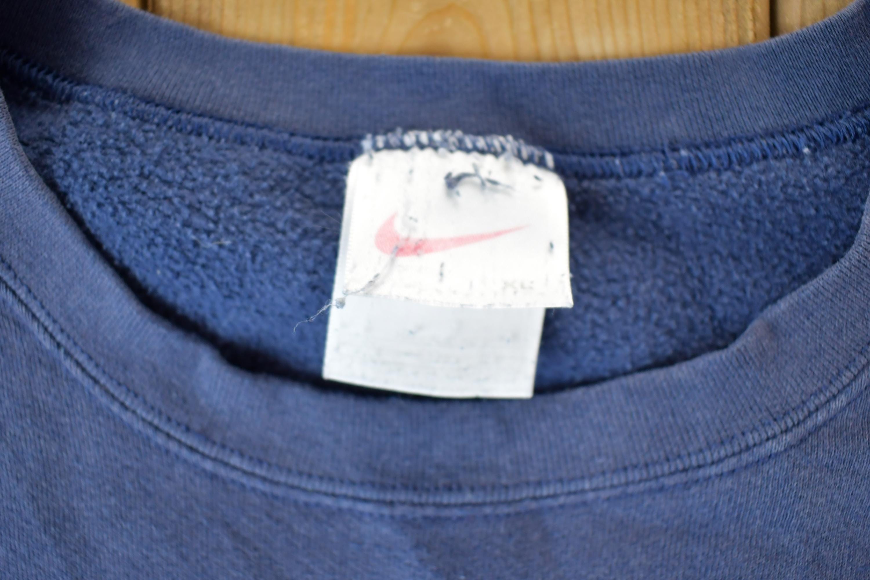 Vintage 1990s Nike Embroidered Mini Swoosh Navy Crewneck Sweatshirt