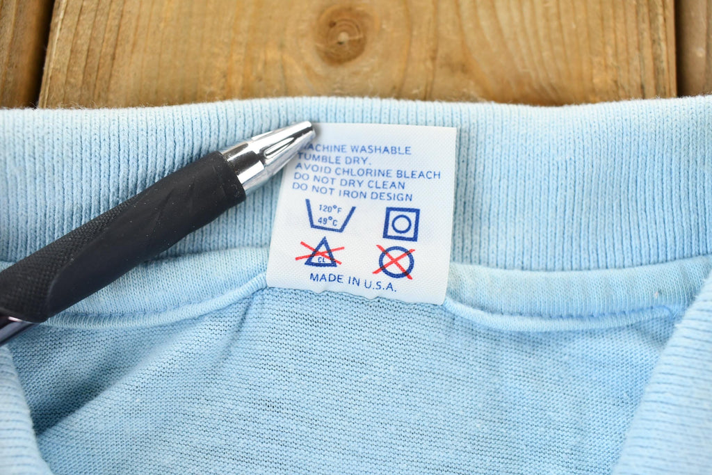 Vintage 1990s Light Blue With Colorful Embroidered Sleeves Hawaiian Island Souvenir Polo Shirt