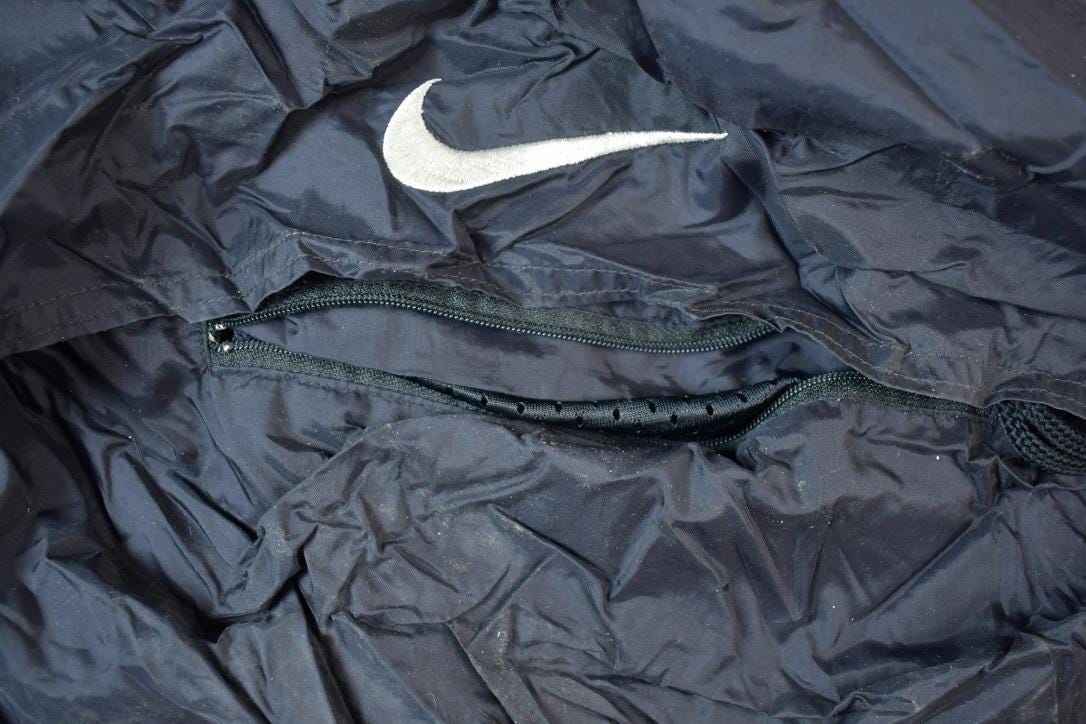 Vintage 1990s Nike Hidden Pocket Windbreaker Jacket