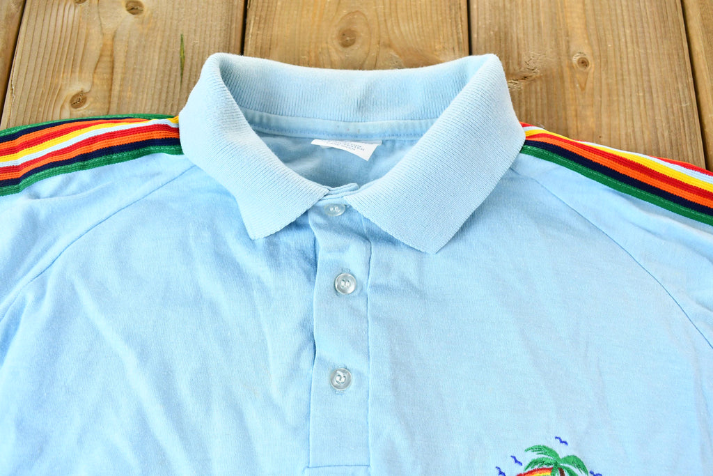 Vintage 1990s Light Blue With Colorful Embroidered Sleeves Hawaiian Island Souvenir Polo Shirt