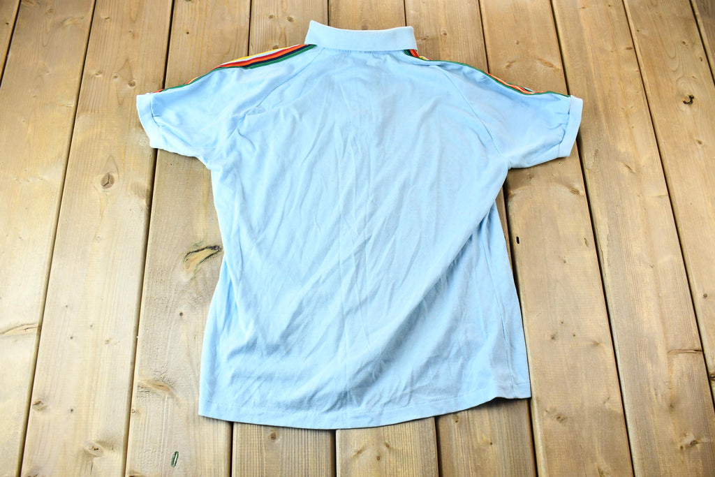 Vintage 1990s Light Blue With Colorful Embroidered Sleeves Hawaiian Island Souvenir Polo Shirt