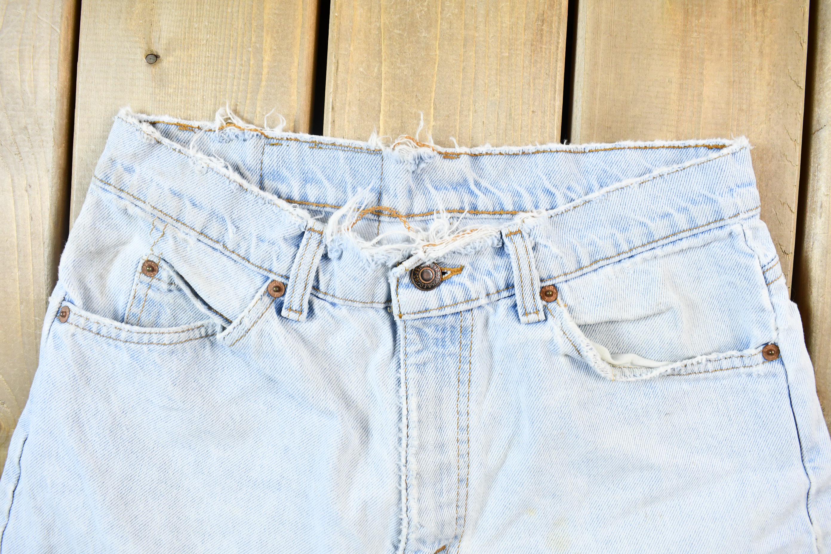 Vintage 1990s Light Wash Levis Cutoff Jean Shorts Size 30 x 10