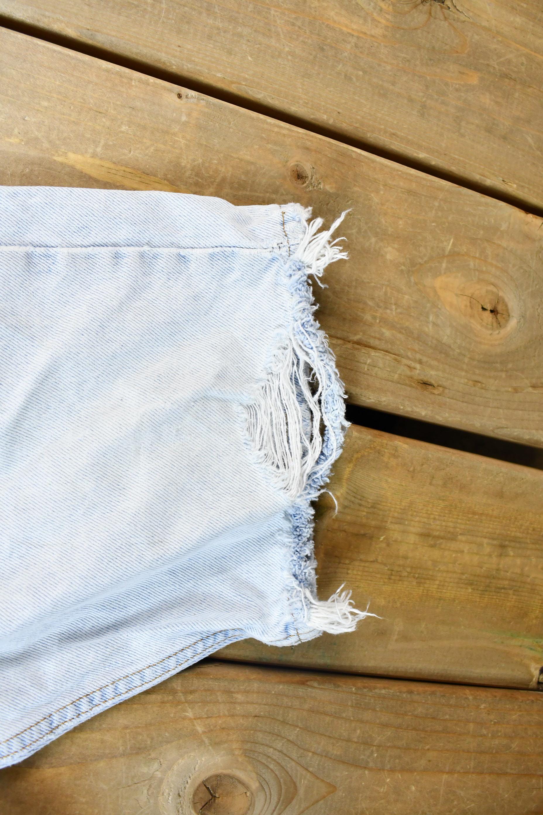 Vintage 1990s Light Wash Levis Cutoff Jean Shorts Size 30 x 10