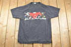 Vintage 1990s Dale Jr Looney Toons Monte Carlo Race Car Racing Graphic T-Shirt