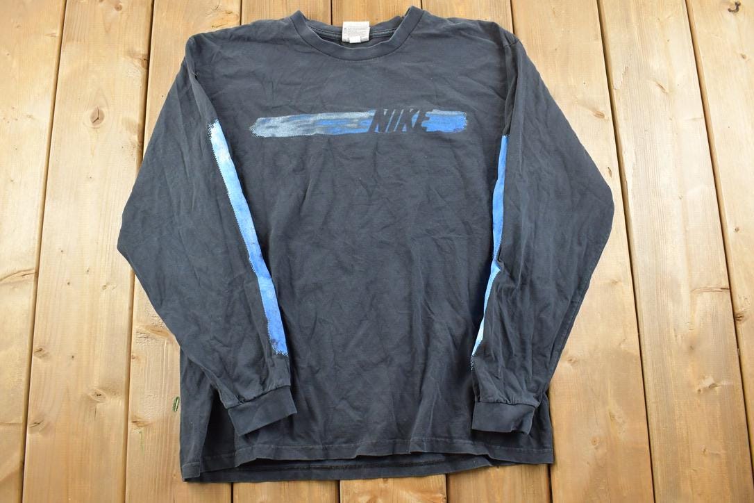 Vintage 1990s Nike Mini Swoosh Crewneck shirt