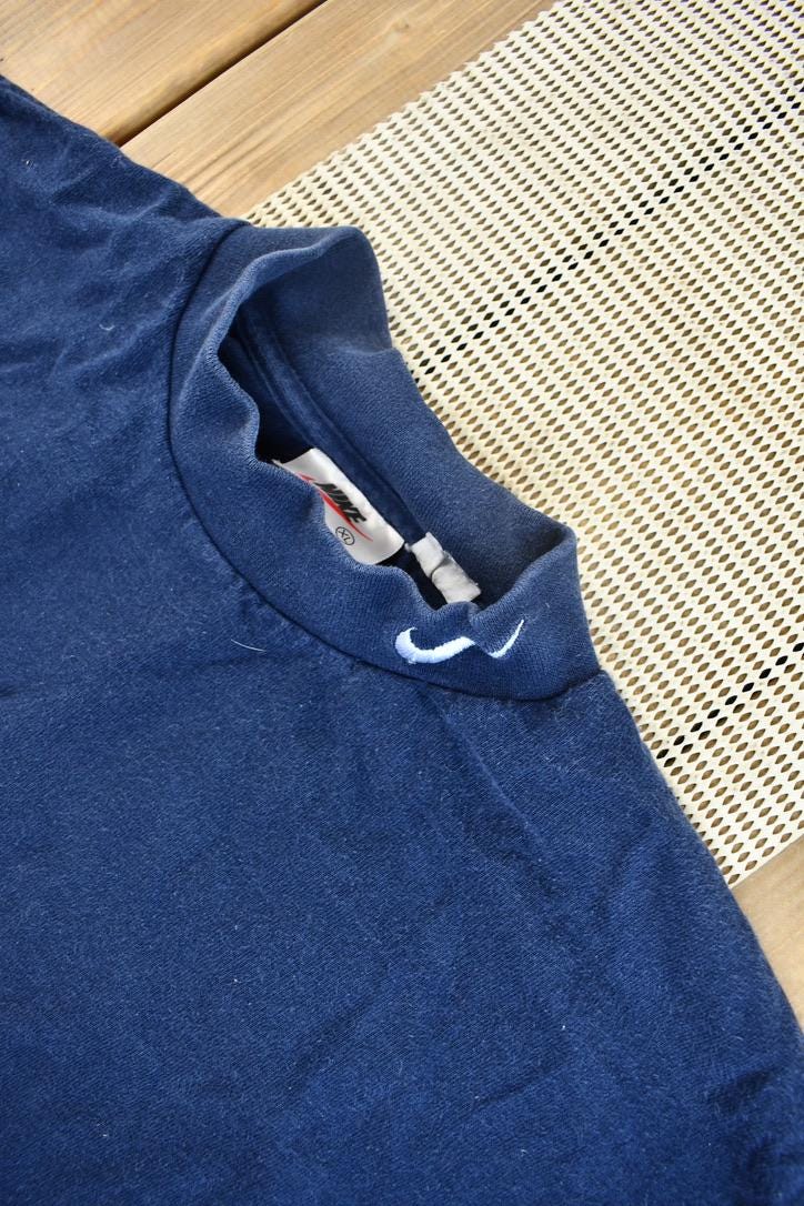 Vintage 1990s Nike Embroidered Mini Swoosh Mock Neck Shirt