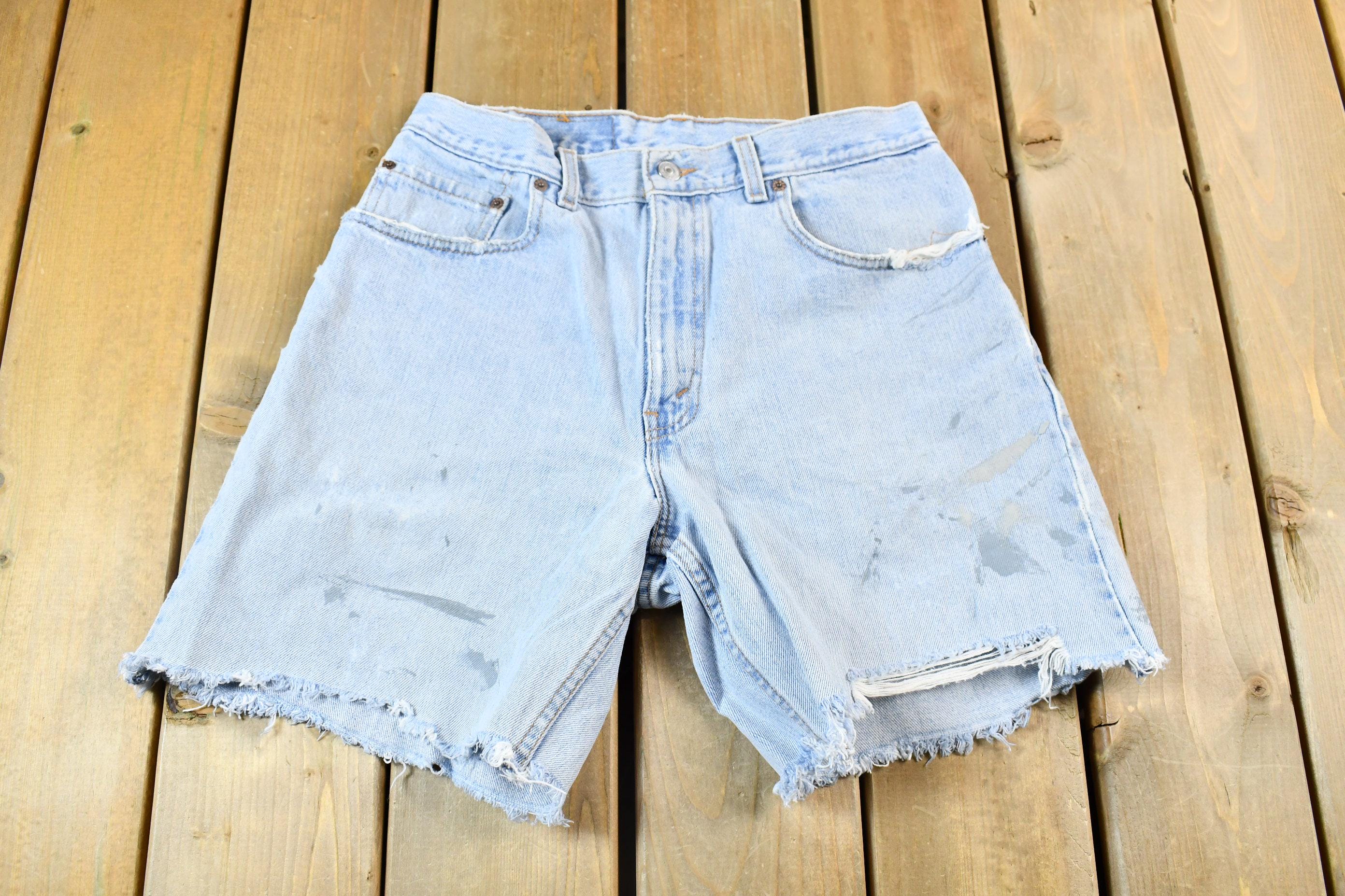 Vintage 1990s Light Wash Levis Cutoff Jean Shorts Size 30 x 8