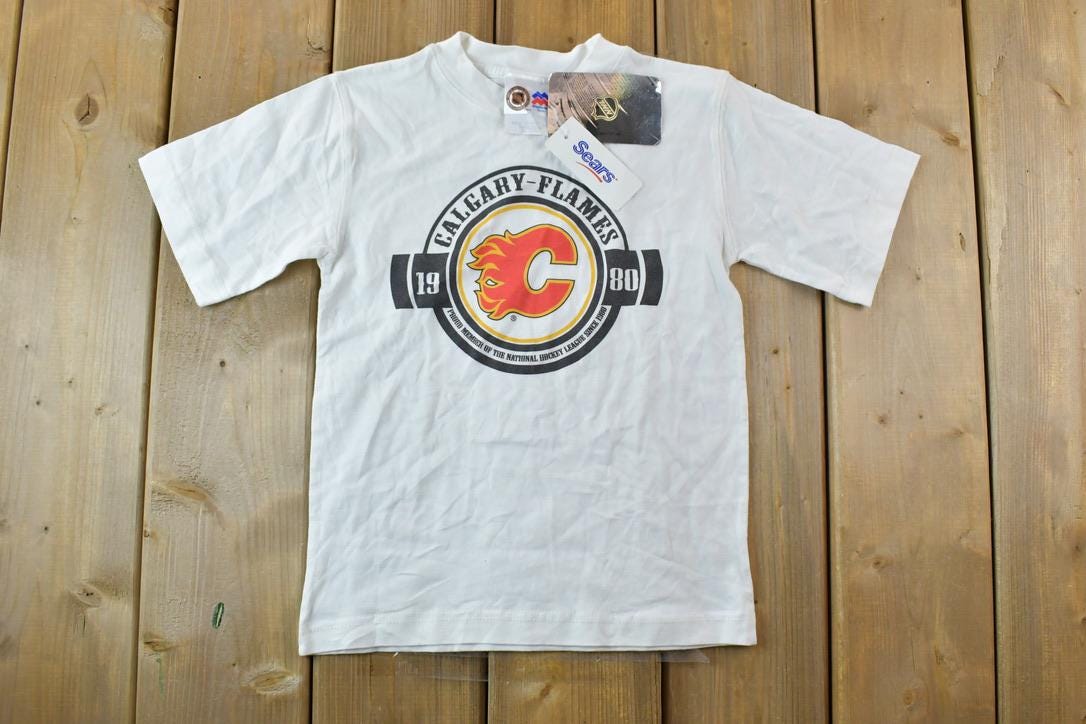 Vintage 1990s Deadstock Youth Calgary Flames NHL Graphic T-Shirt