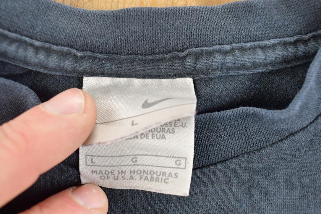 Vintage 1990s Nike Mini Swoosh Crewneck shirt