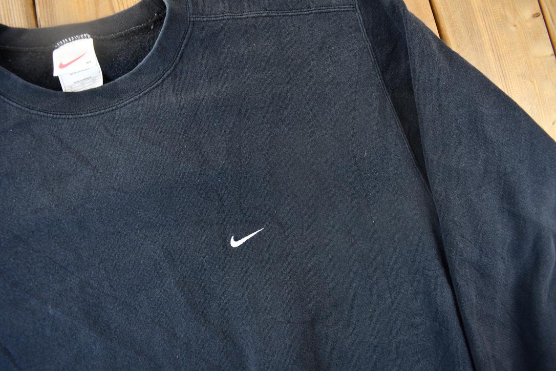 Vintage 1990s Nike Embroidered Black Mini Swoosh Crewneck Sweatshirt