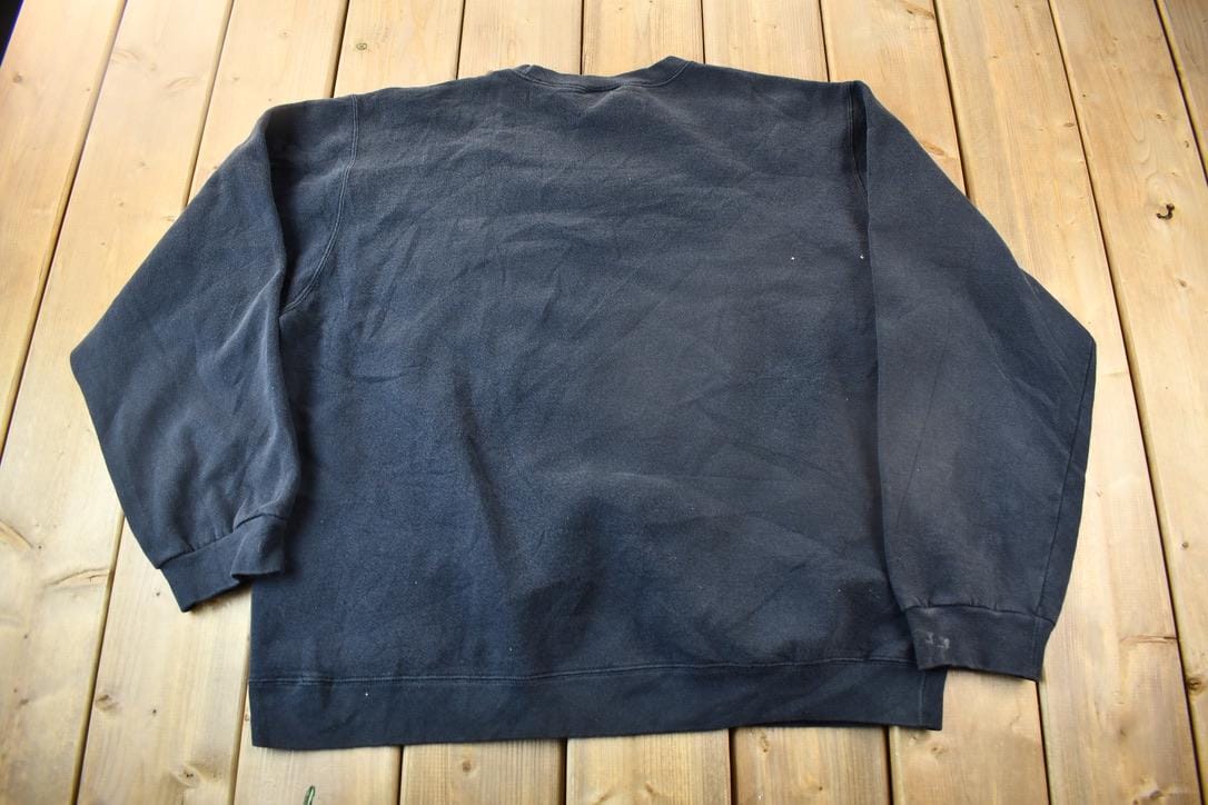 Vintage 1990s Nike Embroidered Black Mini Swoosh Crewneck Sweatshirt