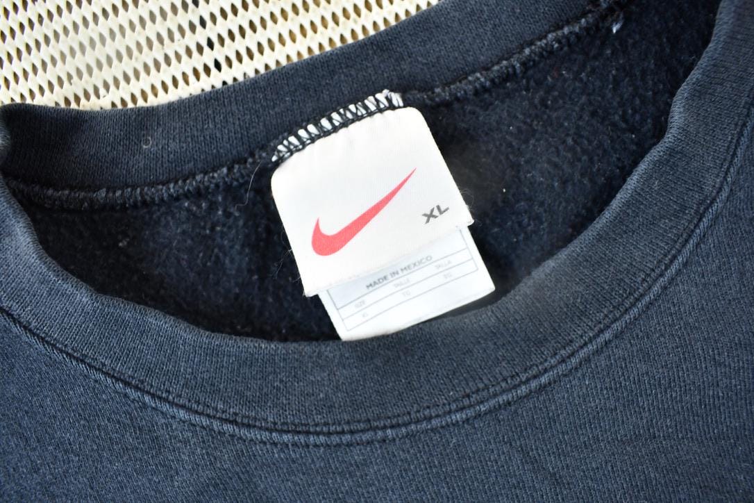 Vintage 1990s Nike Embroidered Black Mini Swoosh Crewneck Sweatshirt